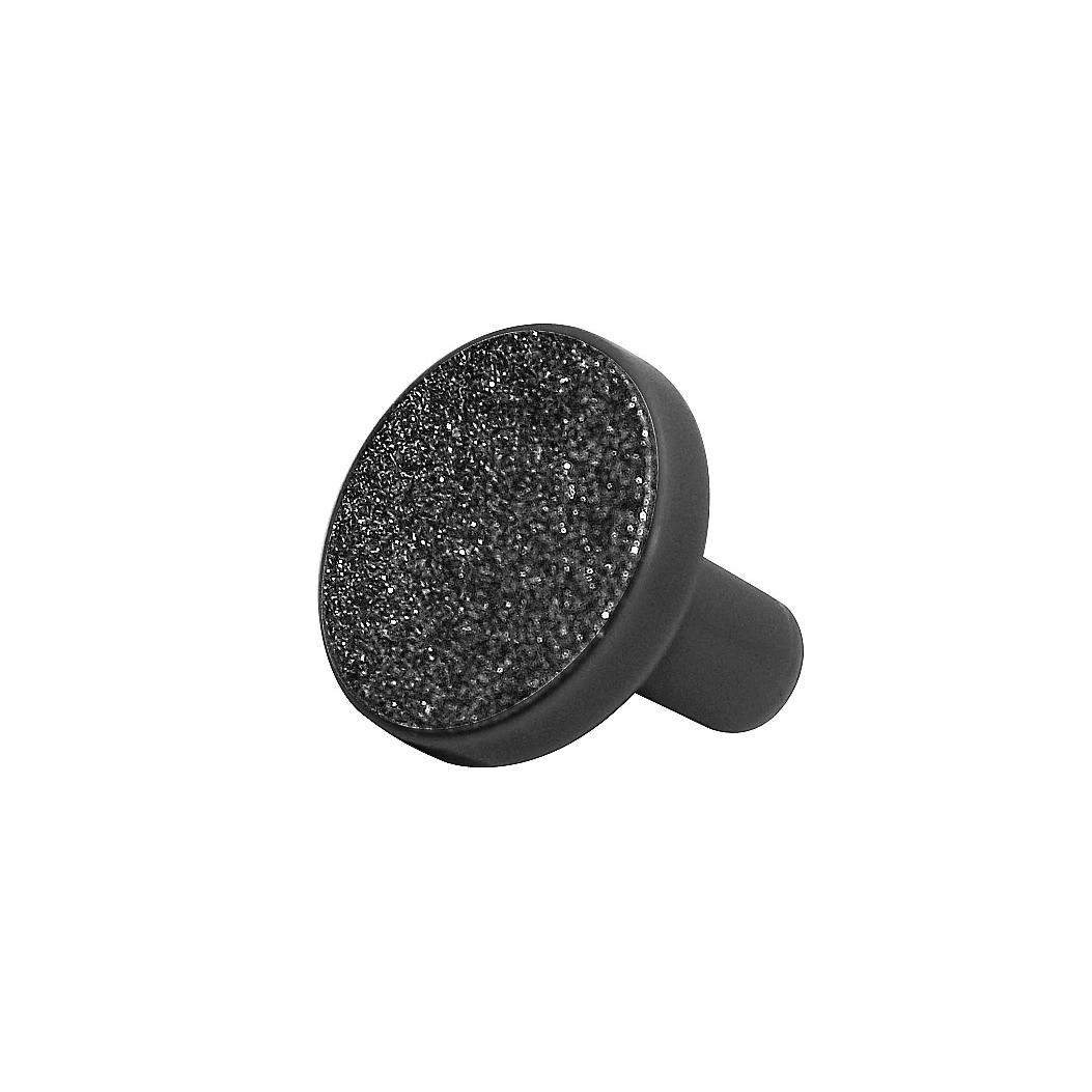 Un cortaúñas negro con superficie brillante y mango.