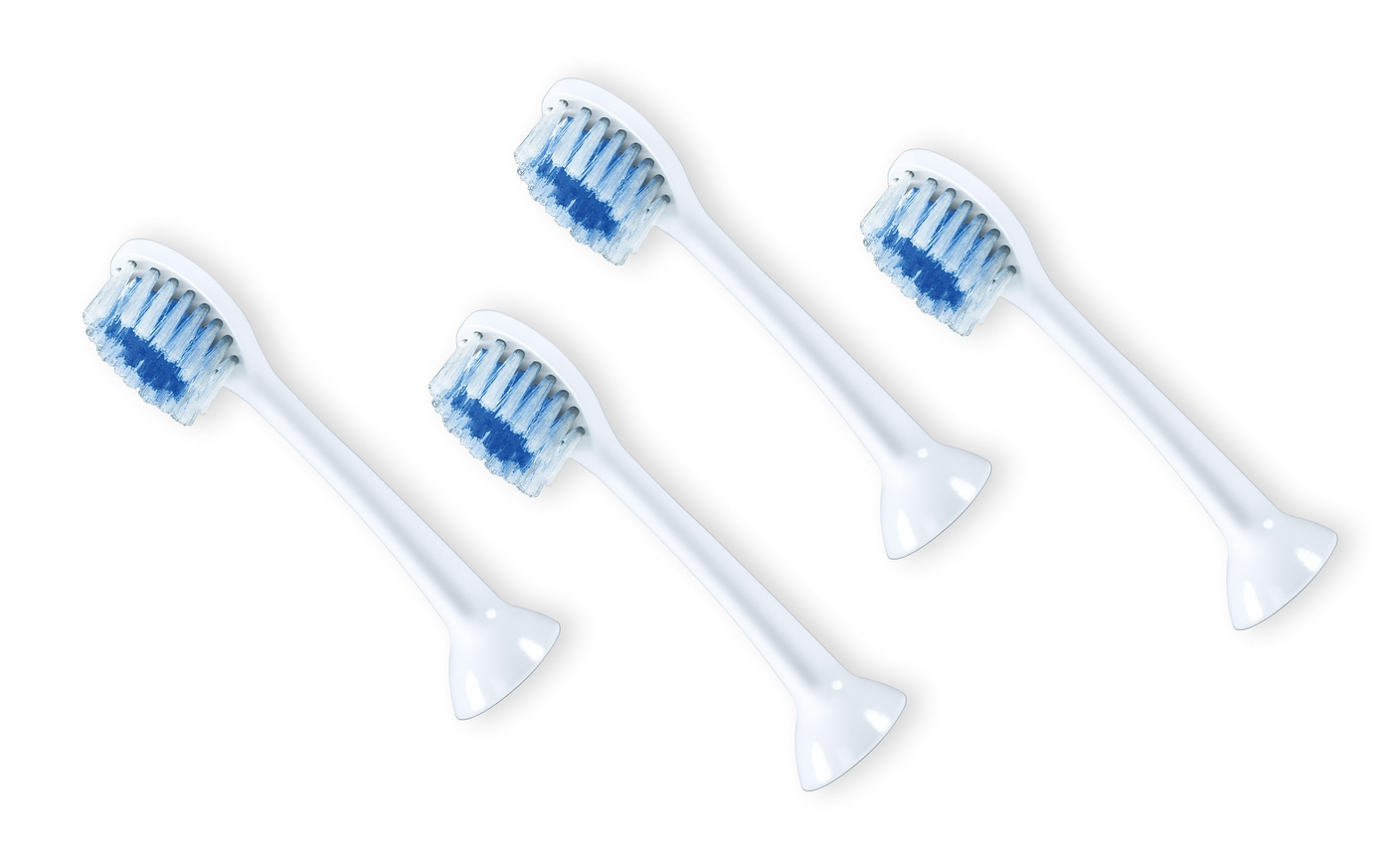 Cabezales de cepillo de dientes, blancos, azules, cuatro piezas, aislados sobre fondo blanco, primer plano