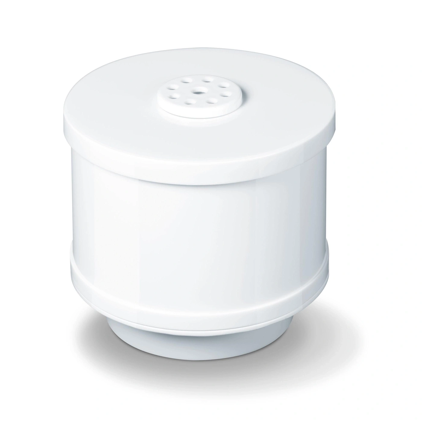Un sensor blanco y cilíndrico con una tapa superior perforada.