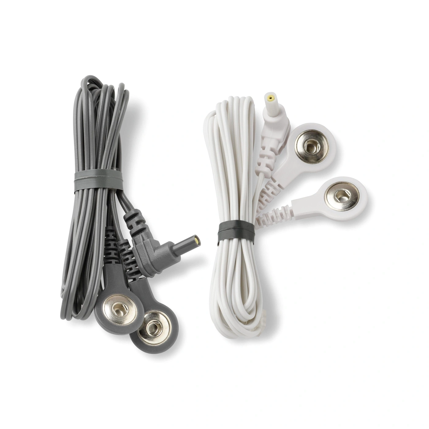 Dos cables con electrodos y enchufes, grises y blancos.